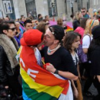 Bratislava, Slovakia: Two men kiss during the Rainbow Pride Parade.