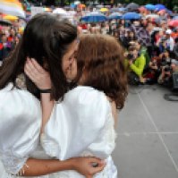 Bratislava, Slovakia: Two women kiss during the Rainbow Pride Parade.